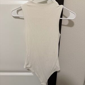 Live in the moment white body suit